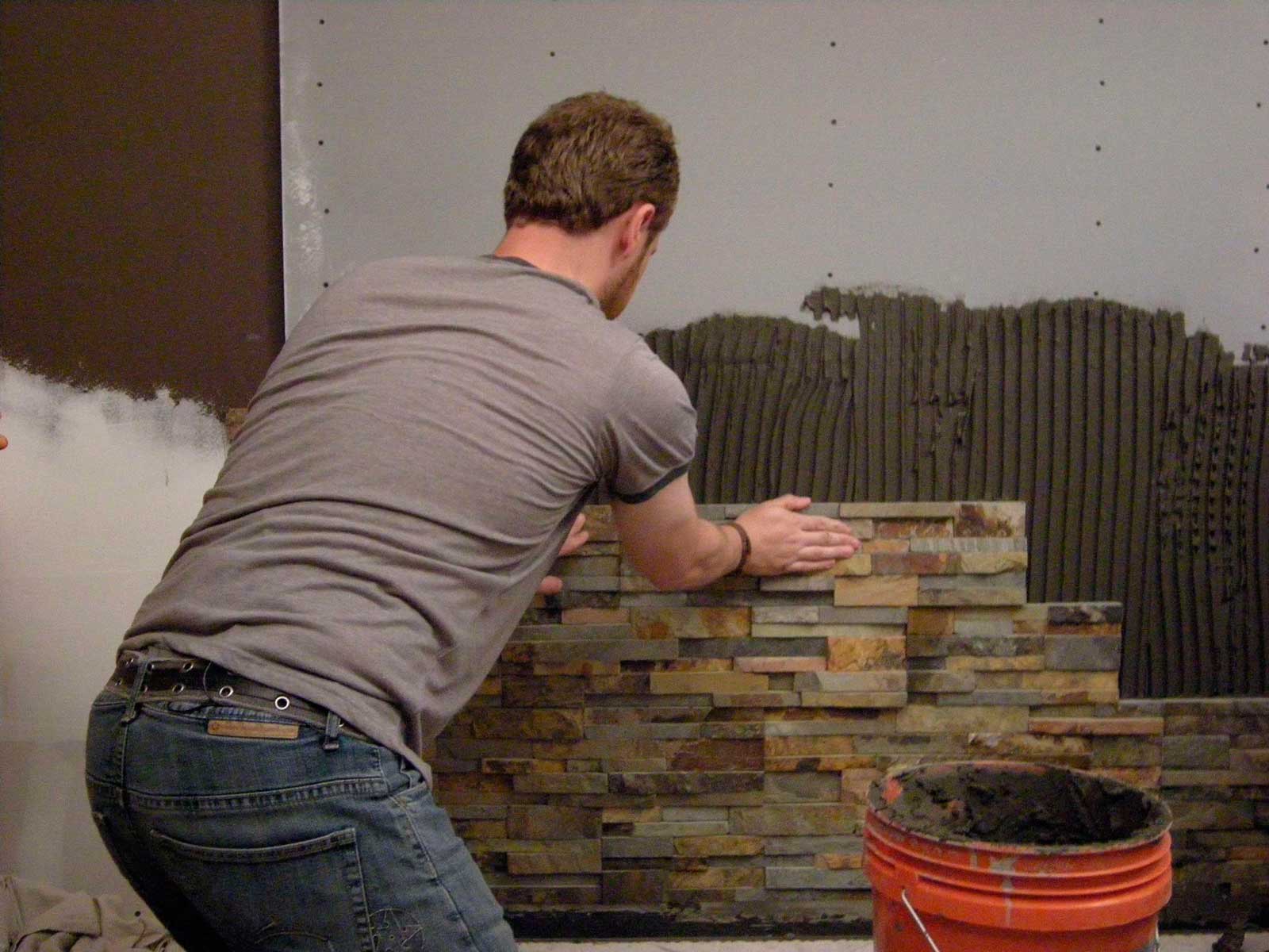 Matthew Muenster Installs Norstone Stacked Stone Ledgestone Panels against drywall in HGTV Television Series I Hate My Bath - Winner of Golden Plunger Award Voted Series Best Bathroom Renovation